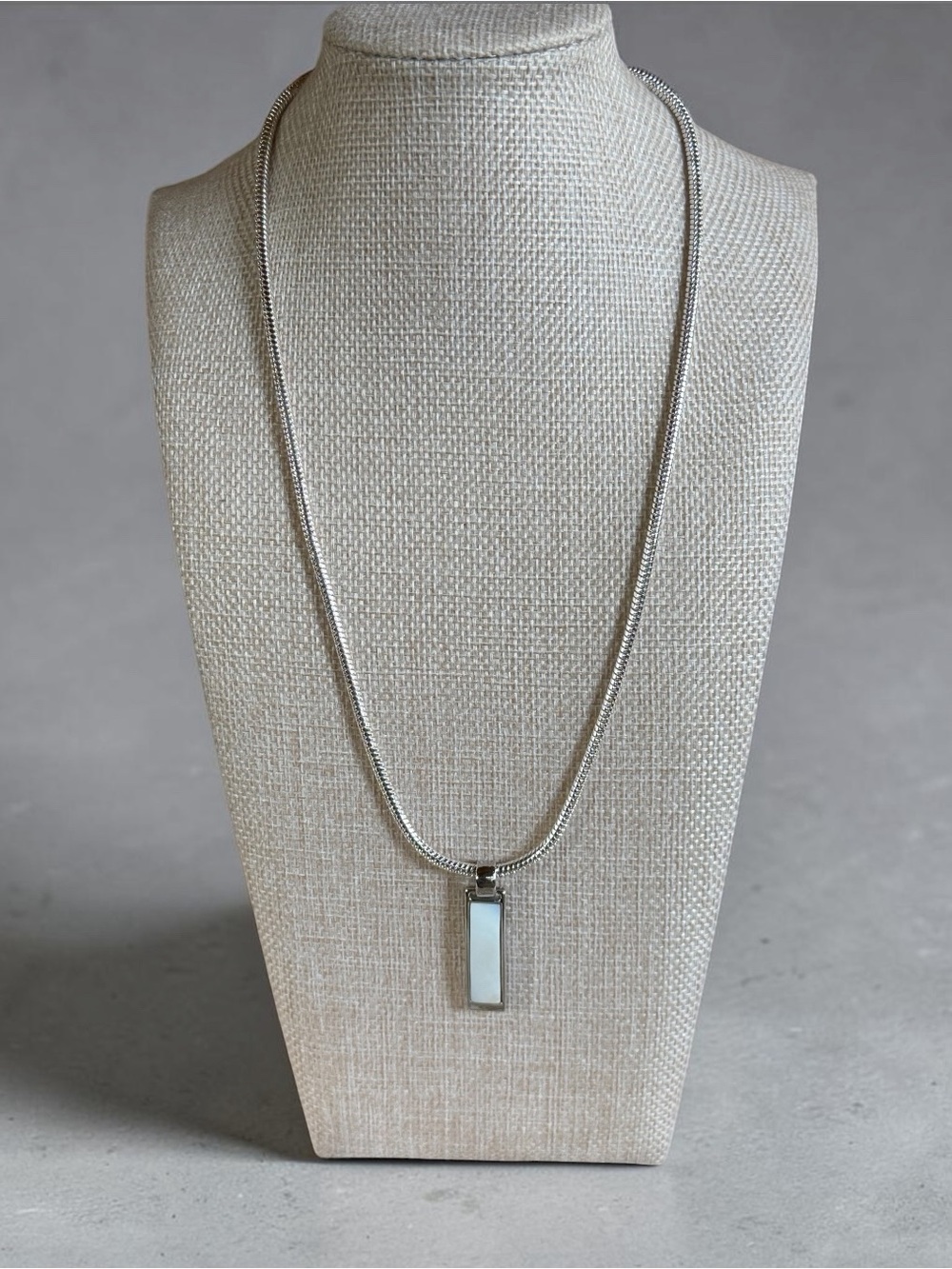 Silver Tone Rectangular Reversible Mother-of-Pearl and Black Pendant Necklace